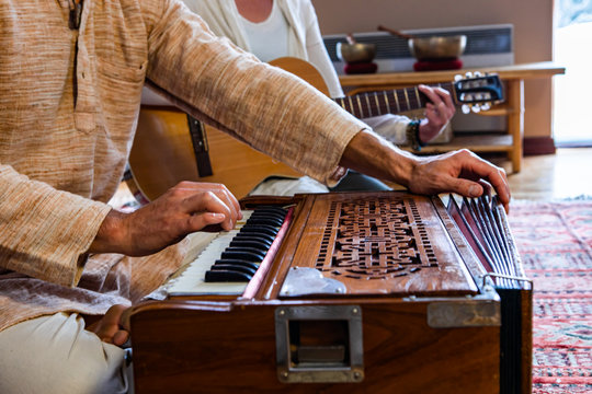 Devotees singing devotional bhajans and kirtans at a temple in Rudraprayag.