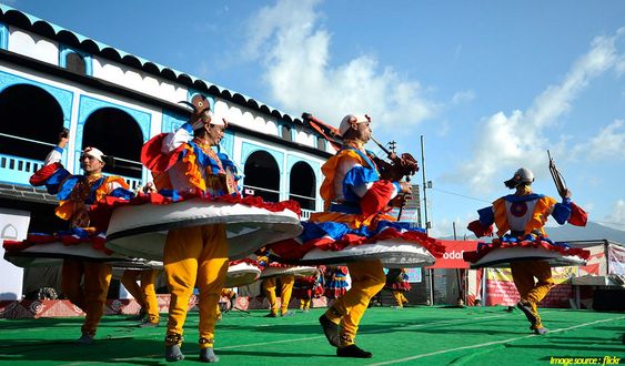 Warriors performing the energetic Chholiya sword dance at a wedding procession.