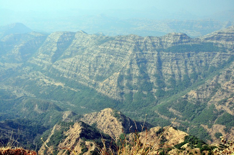 A dramatic cliff edge offering expansive valley views at Elphinstone Point.