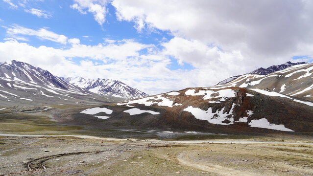 A scenic view of Keylong, one of the top places to visit in Lahaul and Spiti, surrounded by snow-capped peaks.