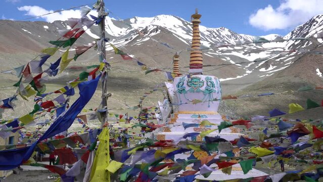 Prayer flags fluttering at Kunzum Pass, the high mountain gateway to Lahaul and Spiti.