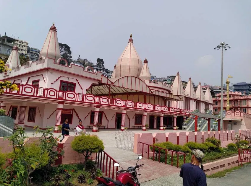 White marble Jain temple complex with intricate carvings and peaceful meditation halls, spiritual places to visit Kalimpong for devotees