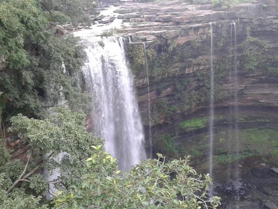 menal waterfalls cascading mountain stream