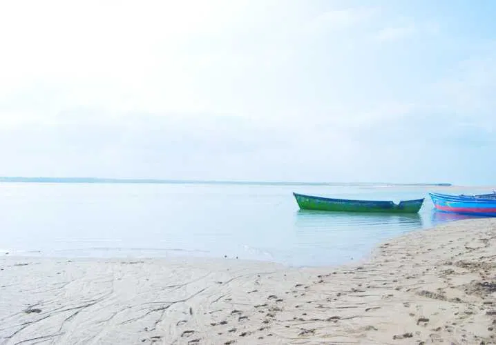Miyana Beach shoreline with peaceful atmosphere and local visitors
