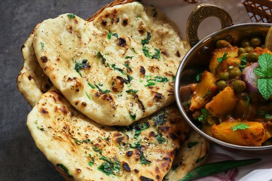 The most iconic spot for Nahari-Kulche is near the Shahpeer Sahab ka Mazaar area, specifically the road known as Garhi Road or the streets near the shrine.