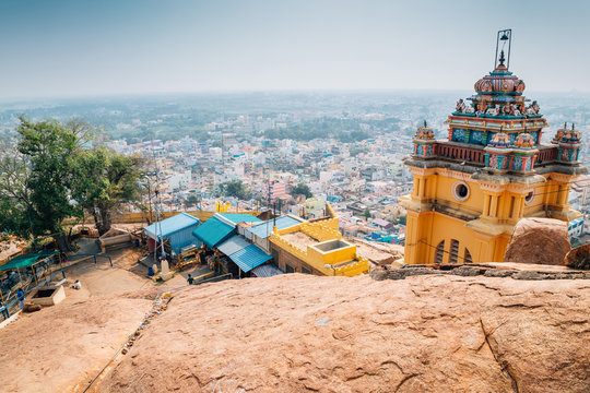 A breathtaking full view of the ancient Rockfort Temple dominating the skyline of Tiruchirappalli.