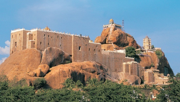 The iconic Rockfort Temple perched atop a massive rock, offering panoramic views of Tiruchirappalli city.