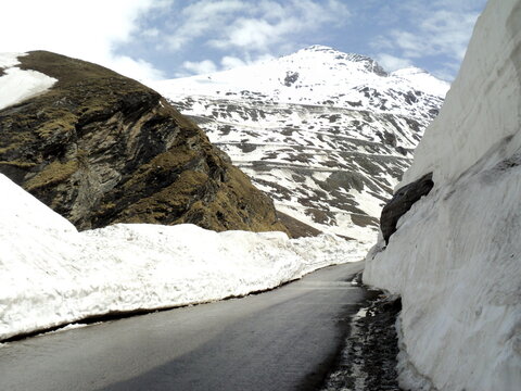 High mountain pass with snow sports, an adventurous place to visit in Kullu.