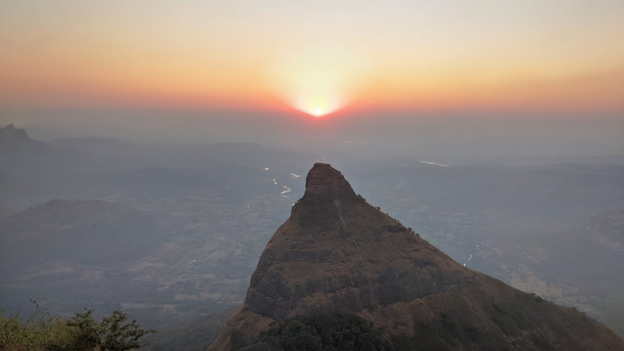 Spectacular Sunset Point places to visit Lonavala showing golden hues behind Sahyadri hills