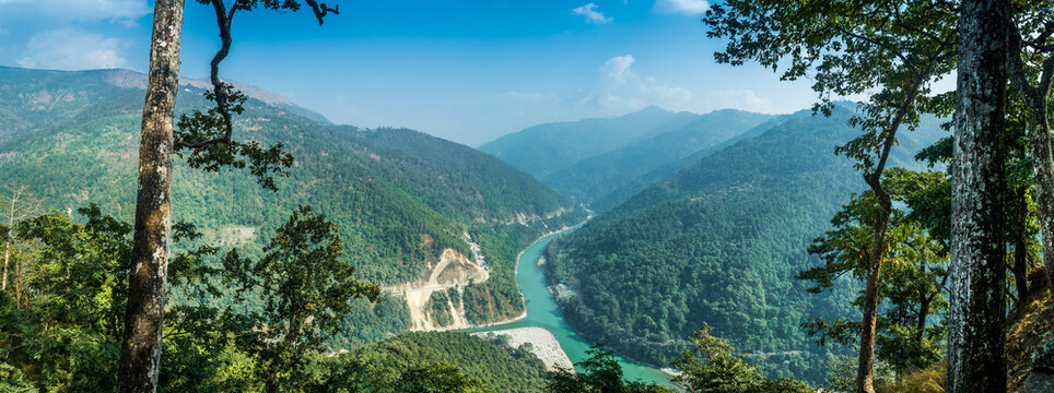 Mighty Teesta River flowing through valleys near Kalimpong with turquoise waters and rapids