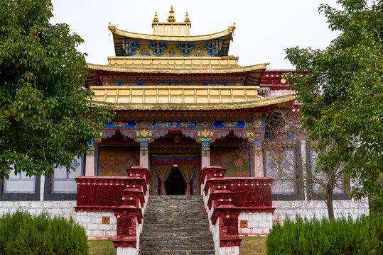 Peaceful Buddhist monastery with prayer wheels, a spiritual place to visit in Kullu.