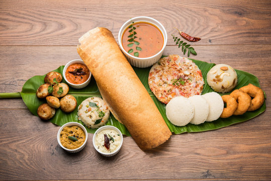 A traditional Tamil breakfast spread with idli, dosa, vada, and sambar.