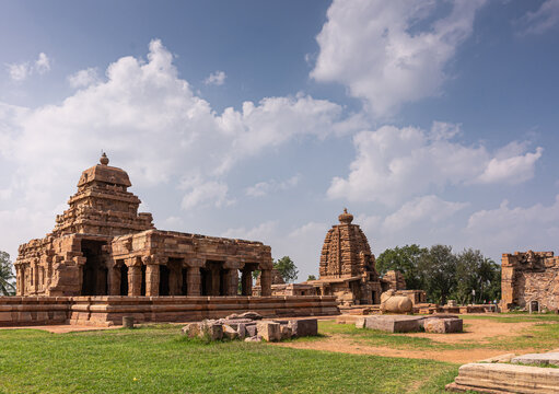 The intricate sculptural details on the temples at Pattadakal, a UNESCO site showcasing the blend of architectural styles in South India's Famous Archaeological Marvels.
