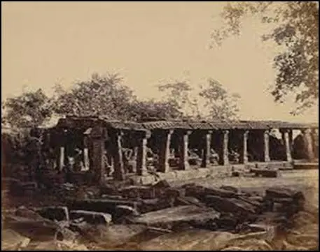 19th century archival photograph of partially collapsed pillared hall ruins of Chausath Yogini Temple, Bhedaghat, from Cunningham's 1874 survey