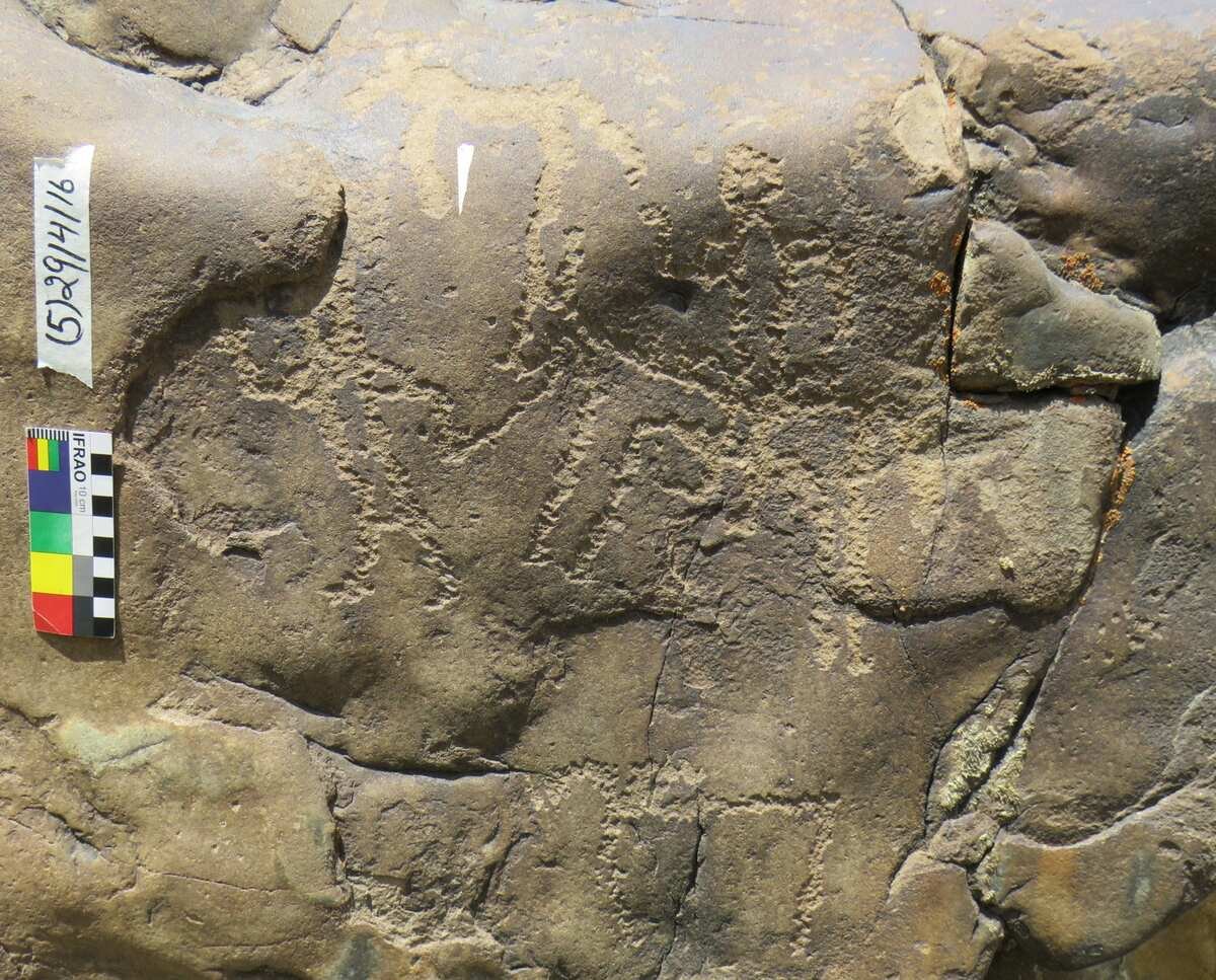 Spiti rocks - Horse rider with a guide holding the reins