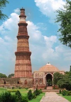 Tallest brick minaret in India (73m) with intricate carvings, part of the Qutub Complex UNESCO site.